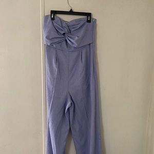 Blue and white pen stripe pantsuit with no sleeves.